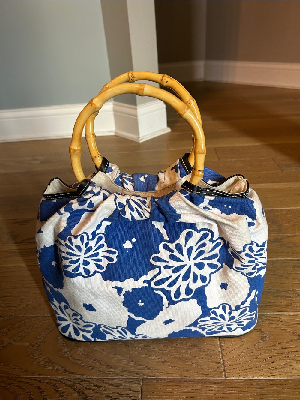 Royal blue floral print handbag with bamboo handle